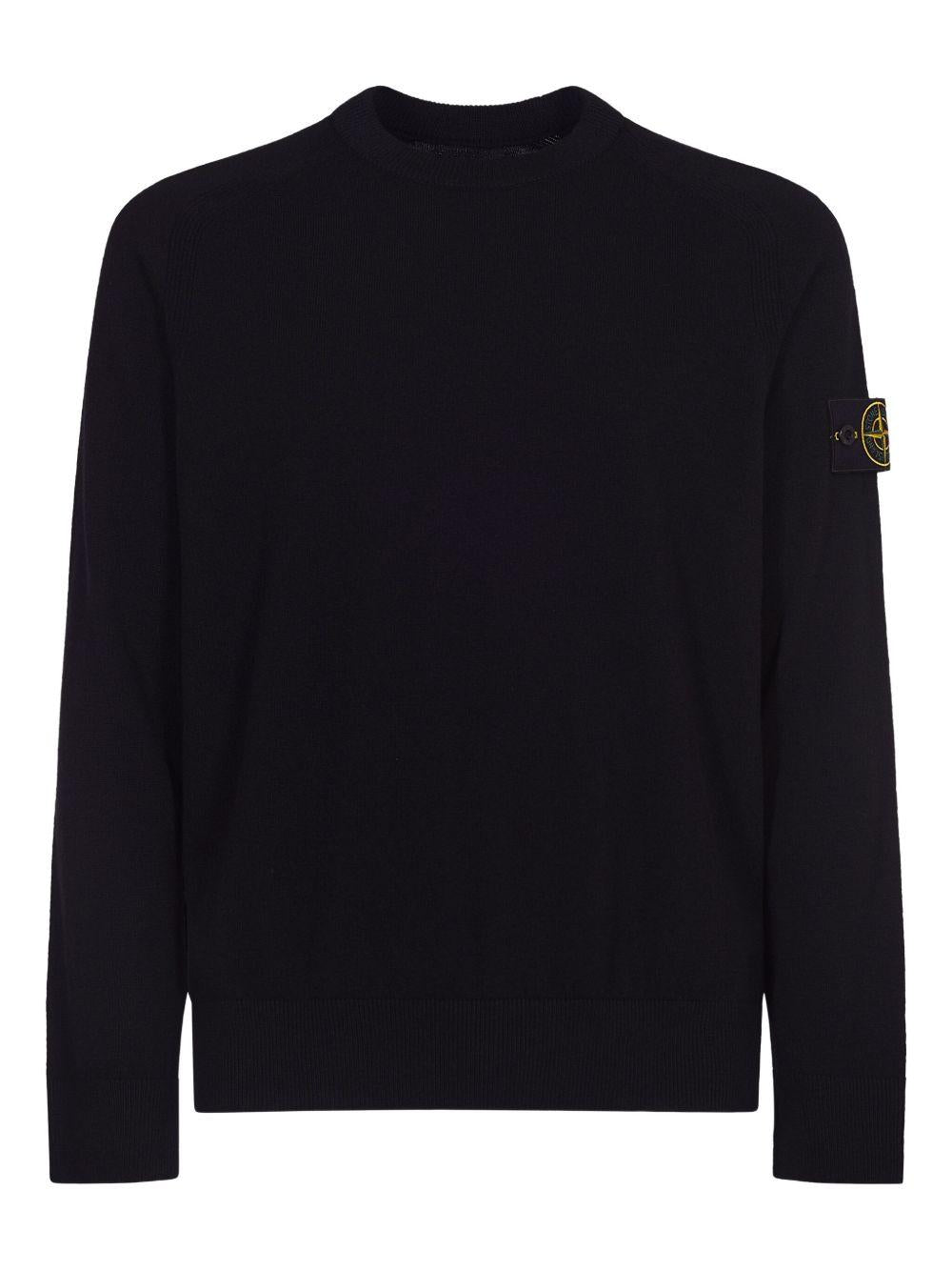 Maglione nero girocollo con dettaglio a coste 