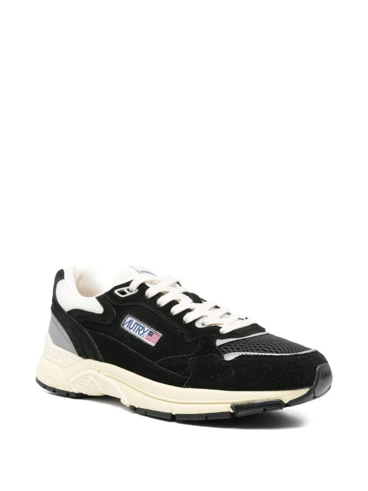Sneakers nere con inserti 