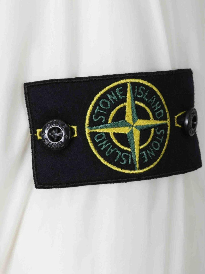 Piumino bianco con cappuccio e logo 