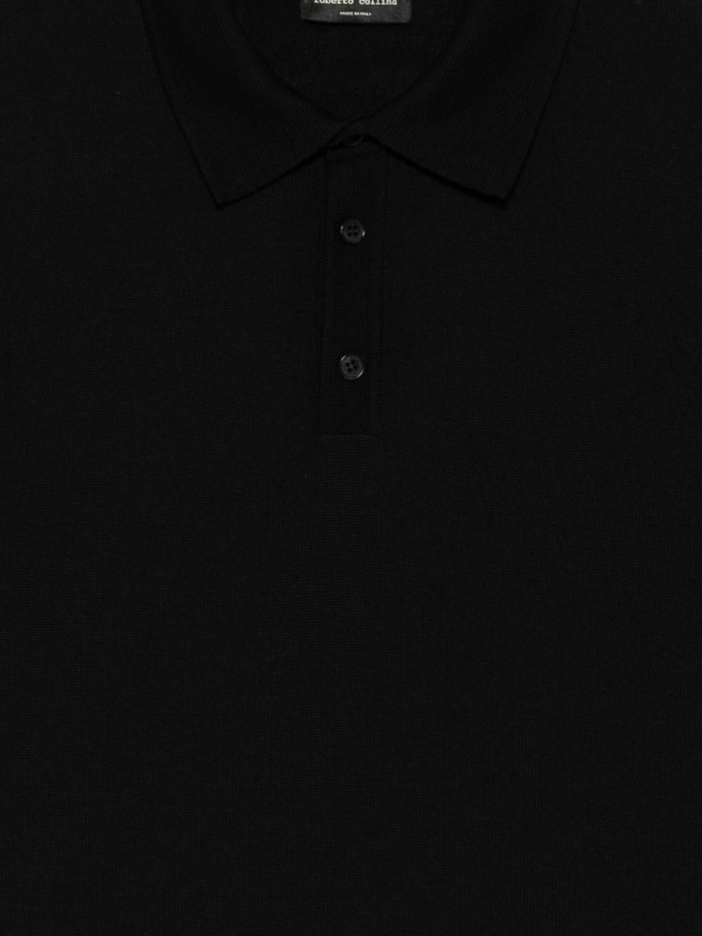 Polo nera a maniche lunghe 