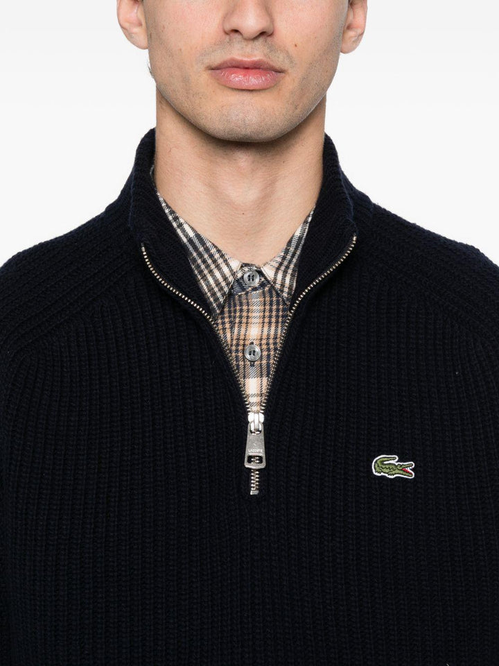 Maglione blu con applicazione 