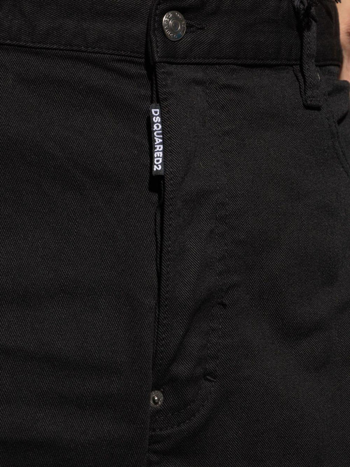 Jeans neri a vita media con applicazione logo 