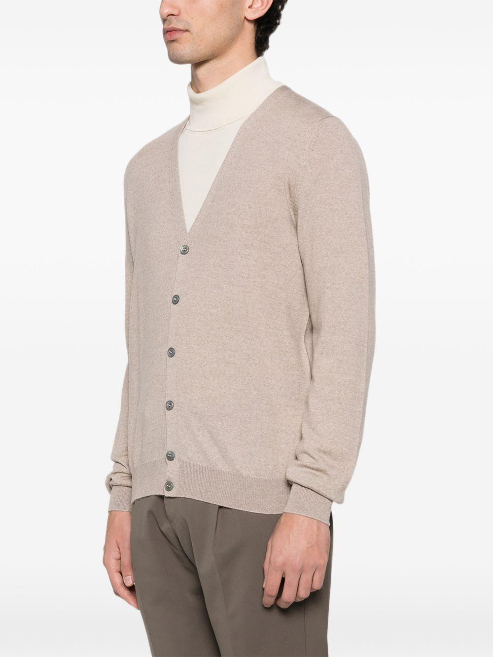 Cardigan beige in lana con bottoni 
