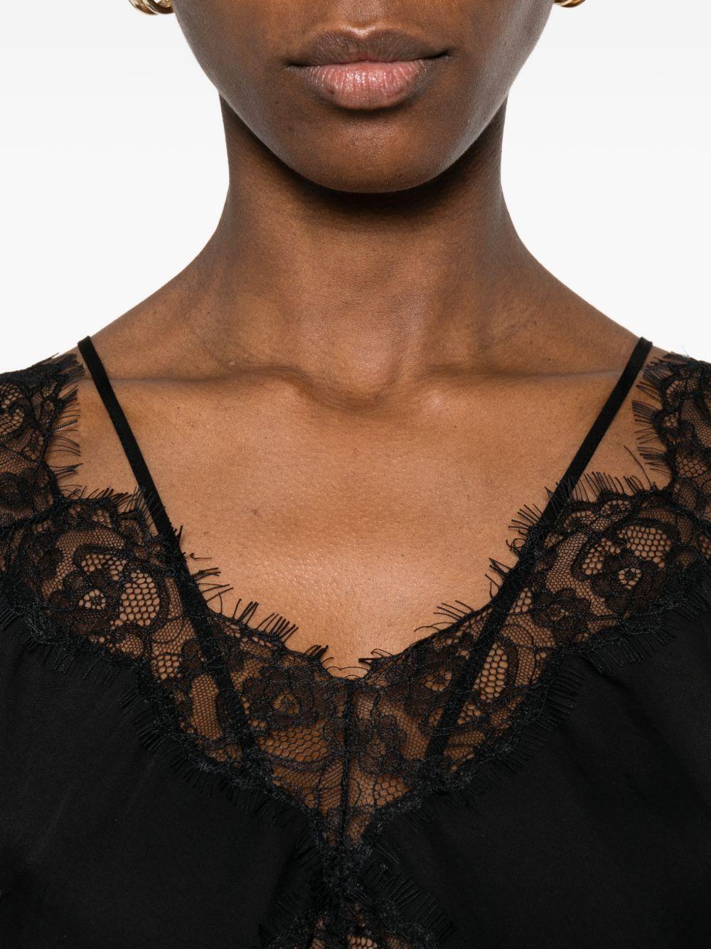 Blusa con scollo a V 