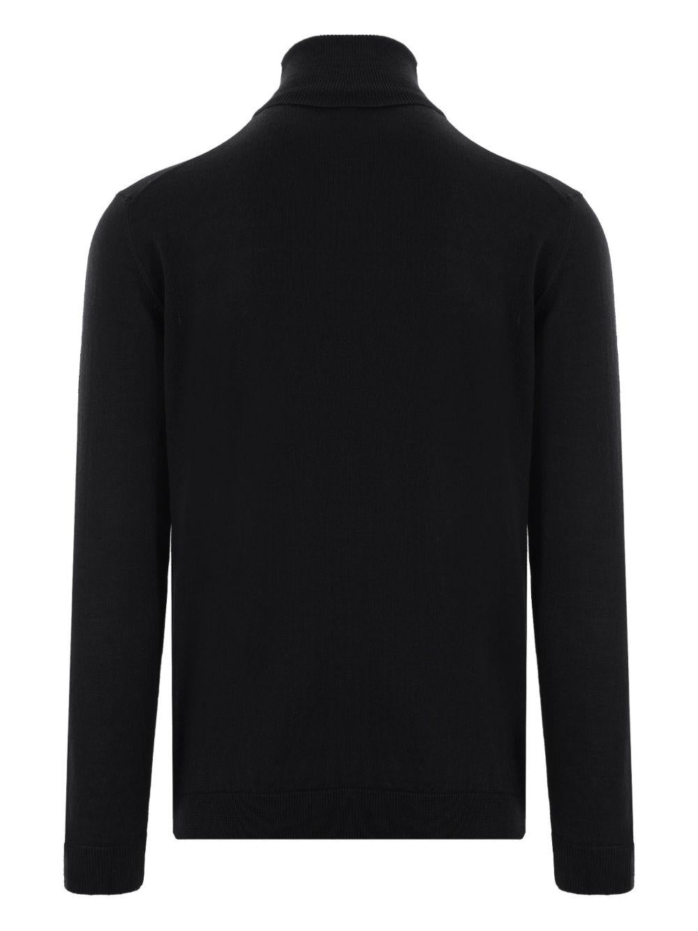 Maglione nero a collo alto in lana merino 