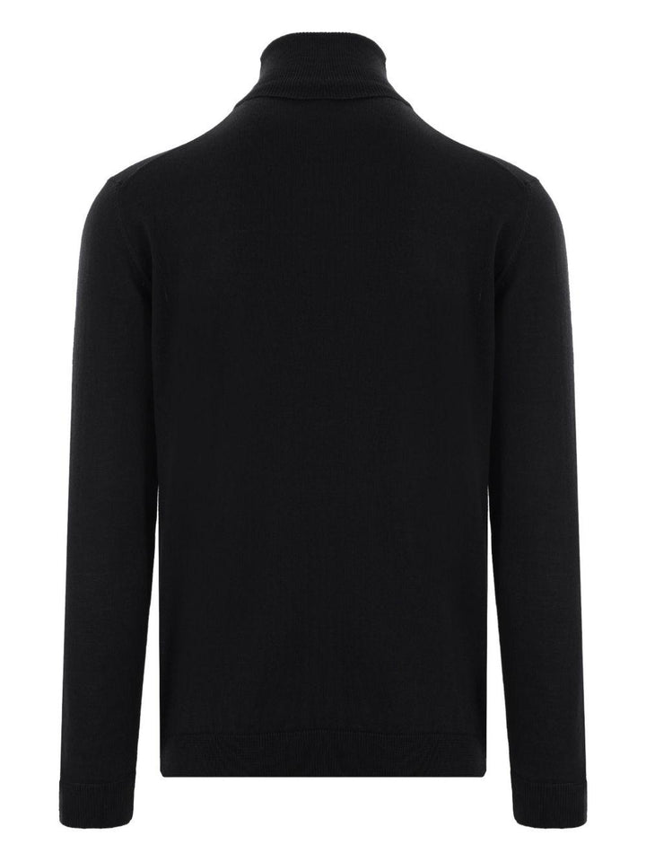 Maglione nero a collo alto in lana merino 
