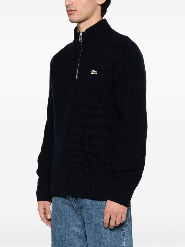Maglione blu con applicazione 