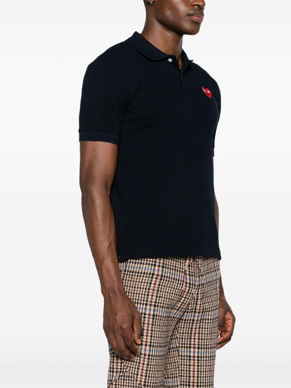 Polo nera con logo ricamato 