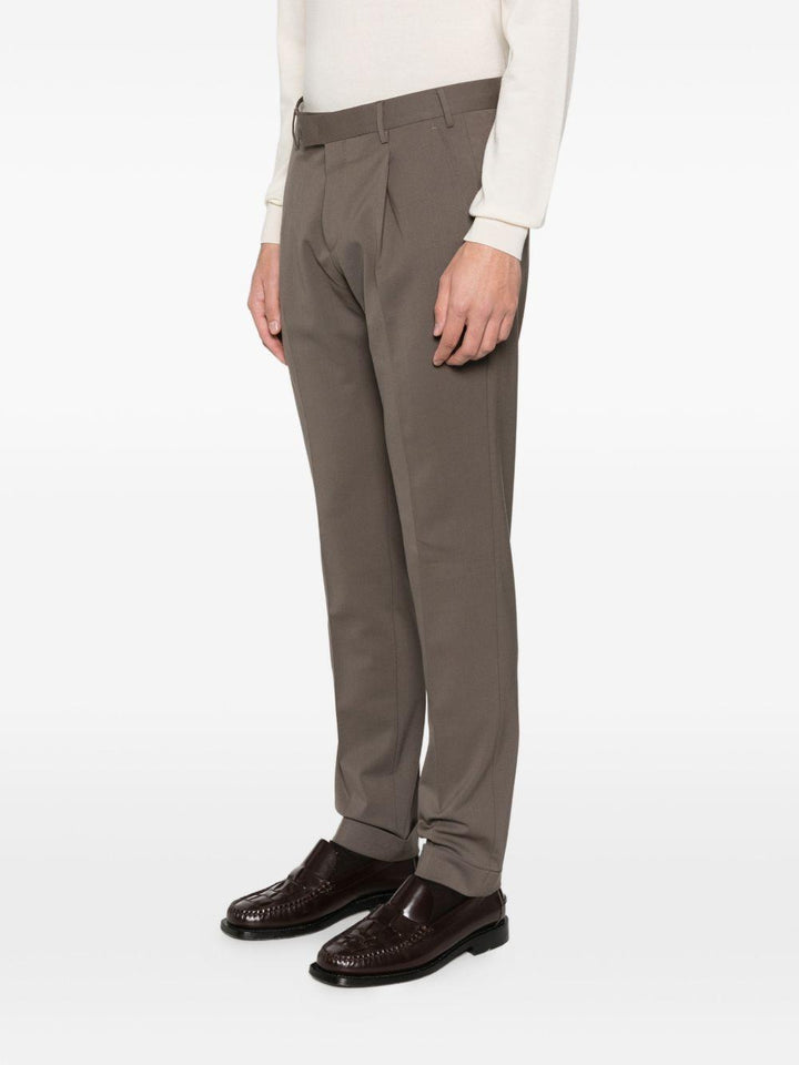 Pantaloni grigi con polsini plissettati 