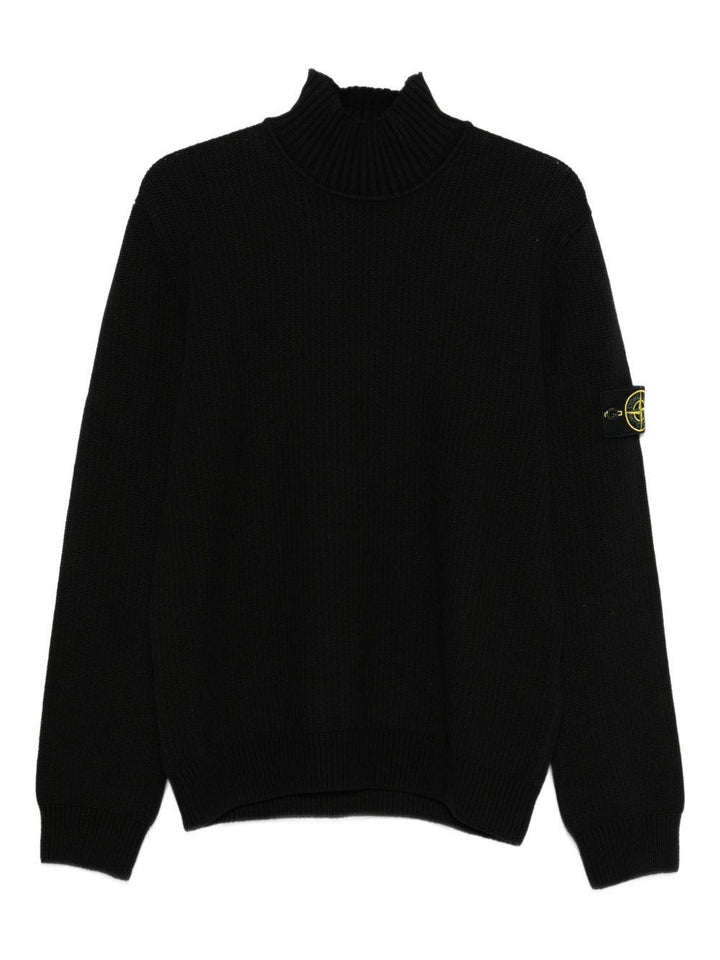 Maglione nero a coste con collo alto 
