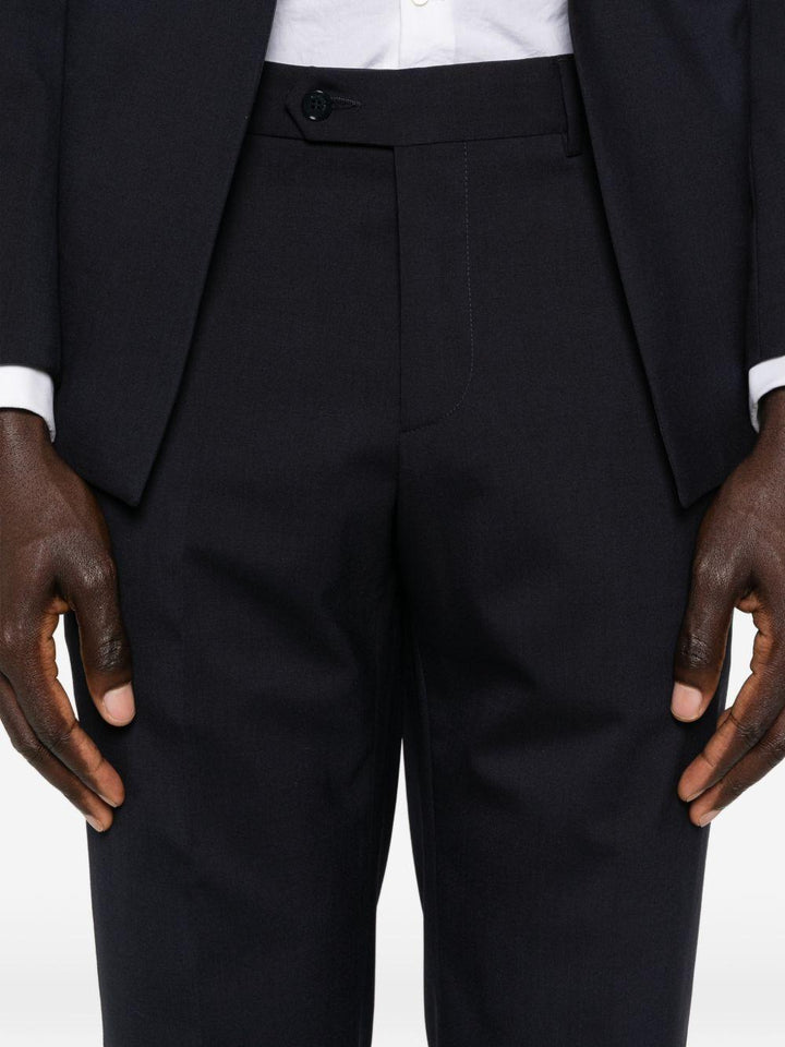 Smoking blu navy doppiopetto con rever sciallato 
