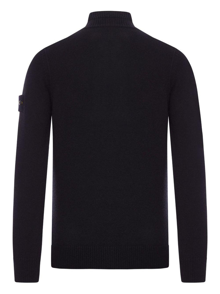 Maglione nero in lana a collo alto con bottoni 