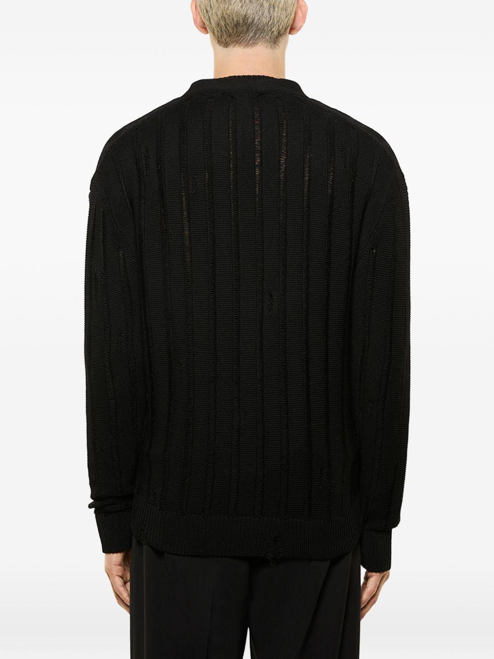 Cardigan nero con trasparenze con bottoni 