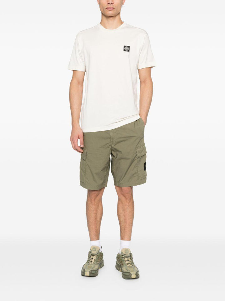 T-shirt avorio con applicazione logo 
