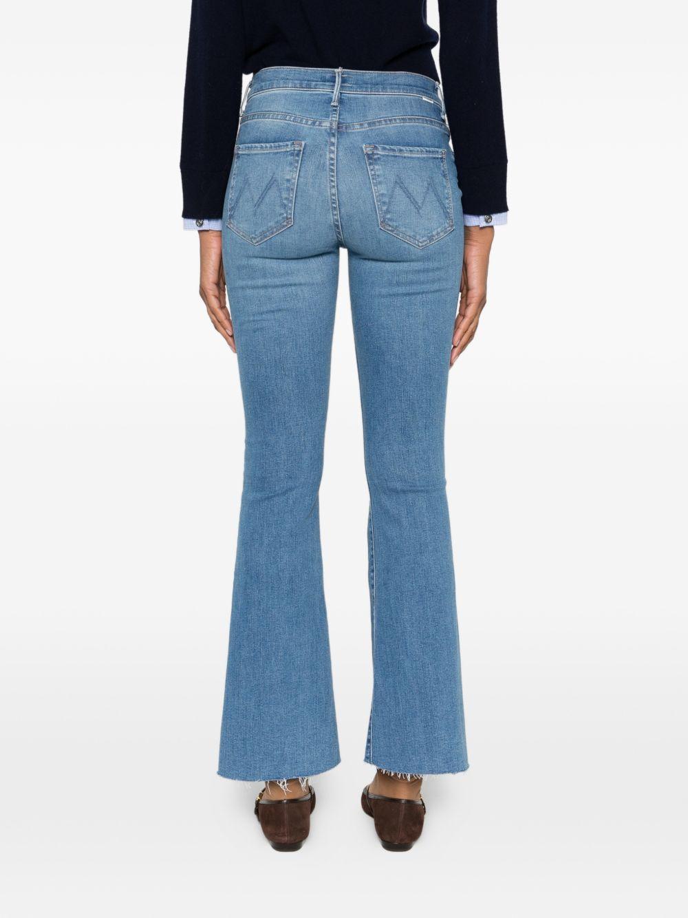 Jeans con orlo sfrangiato 
