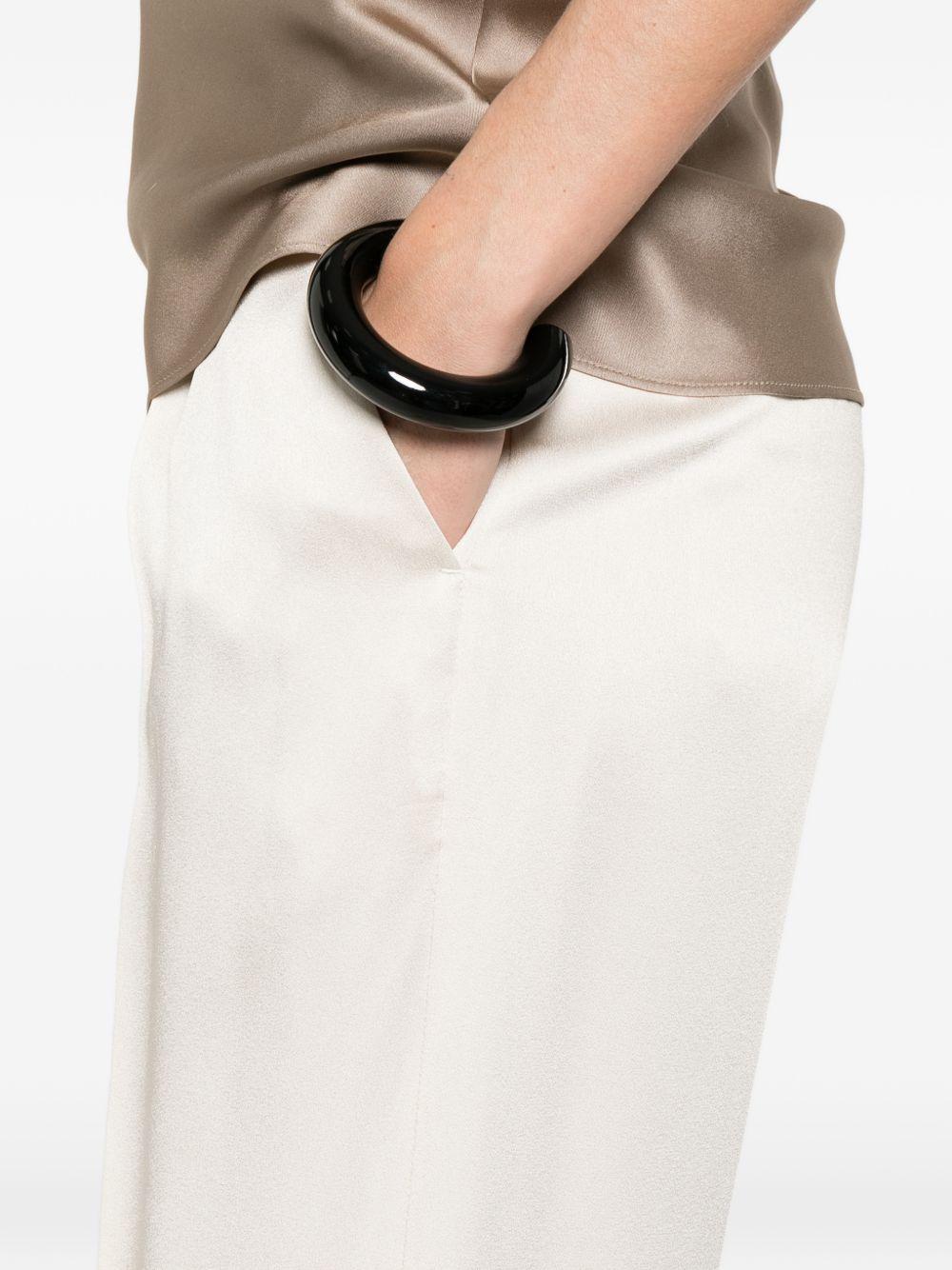 Pantaloni con piega 