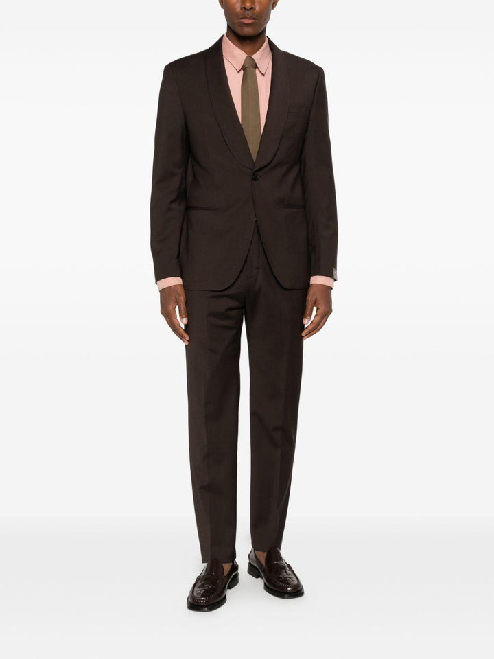 Abito marrone con rever a scialle 