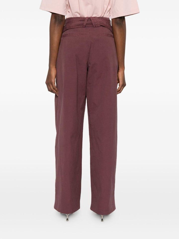 Pantaloni con fibbie 