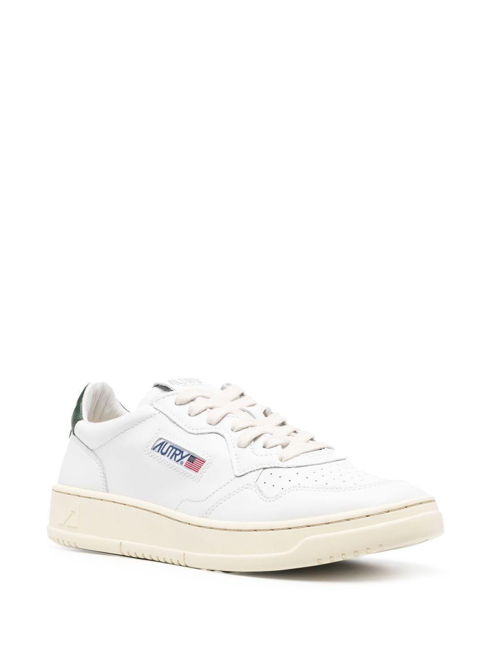 Sneakers bianche Medalist con tallone verde 