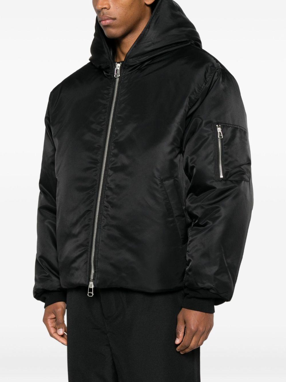 Bomber nero Peacemaker con cappuccio e zip 