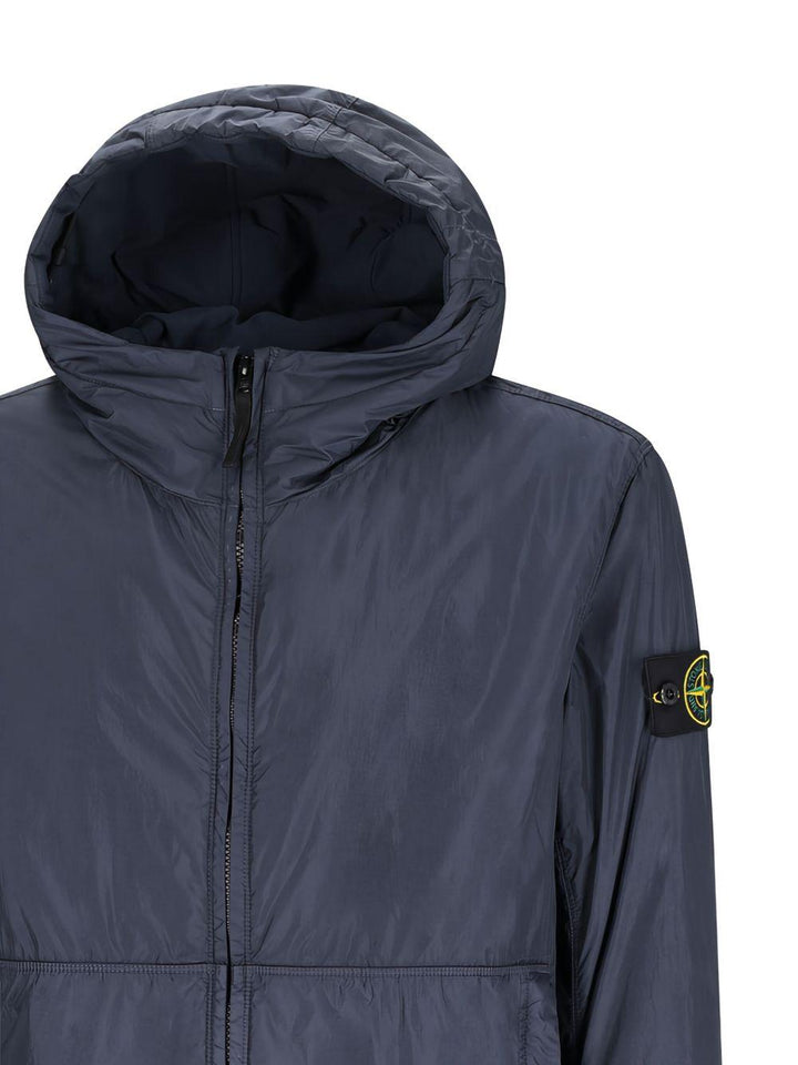 Bomber blu con cappuccio e applicazione Compass 