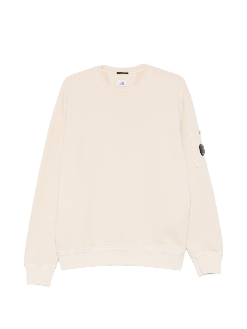 Felpa girocollo beige con dettaglio lente 