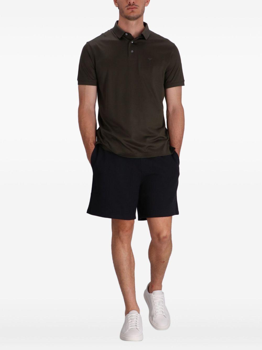 Polo marrone Lyocell con stampa 