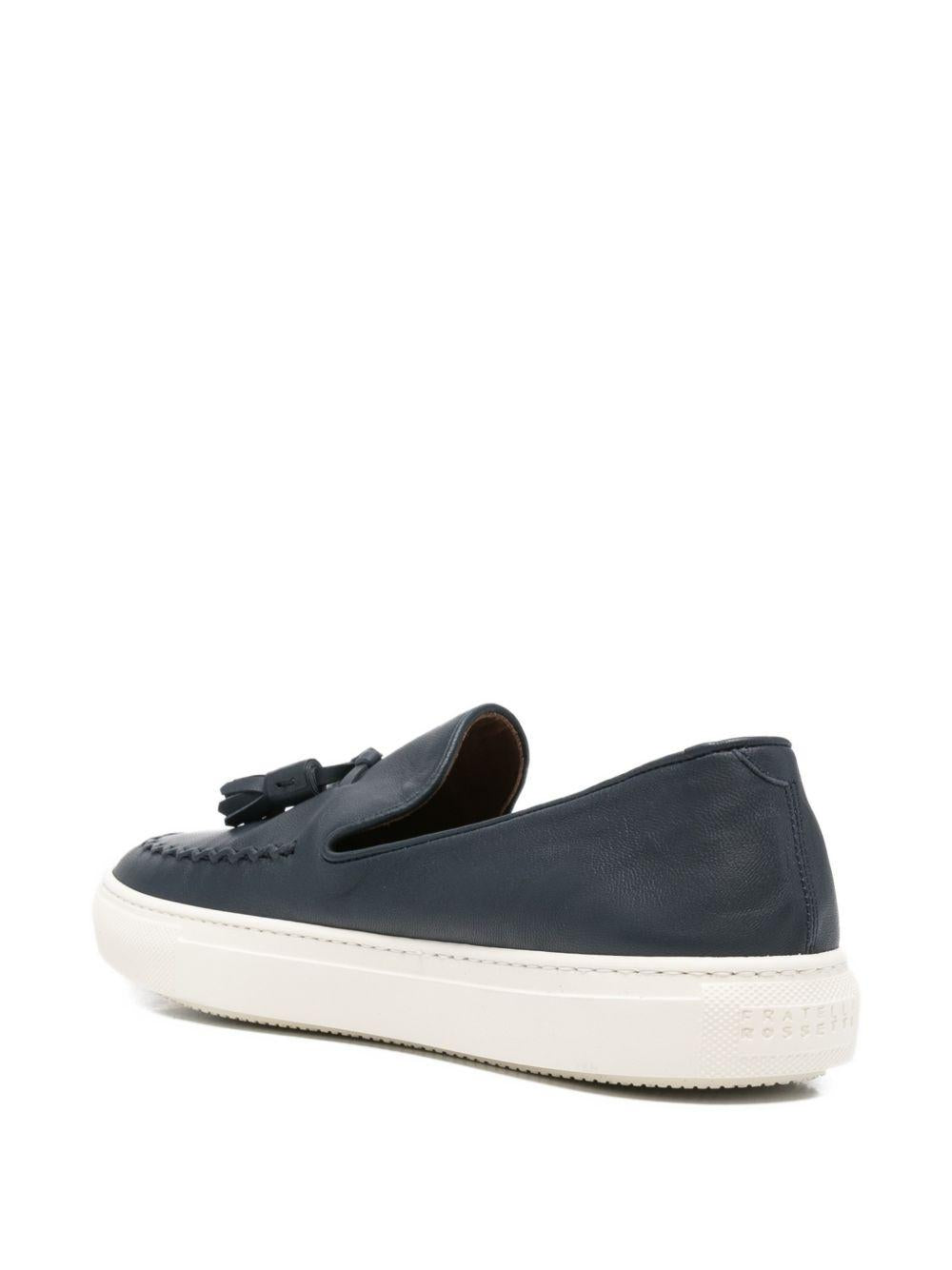 Mocassino marine in pelle con nappine 