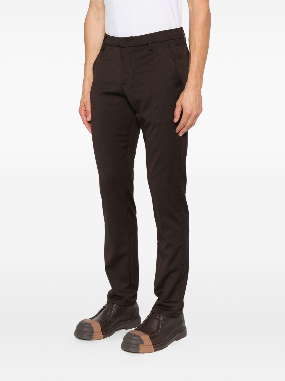 Pantaloni marroni Gaubert in lana con risvolti 