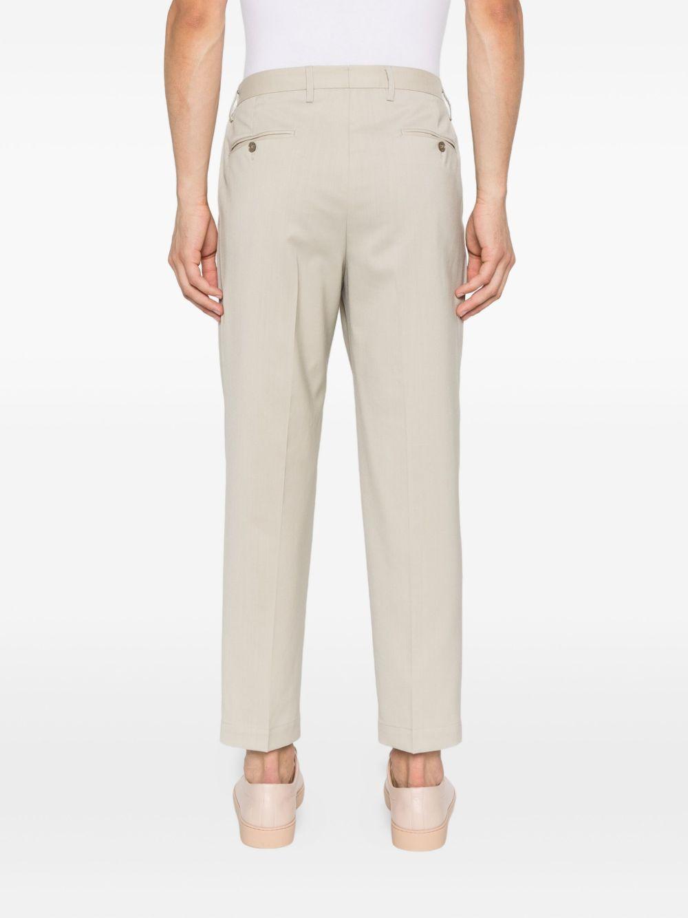 Pantaloni beige con pieghe frontali Portobello 