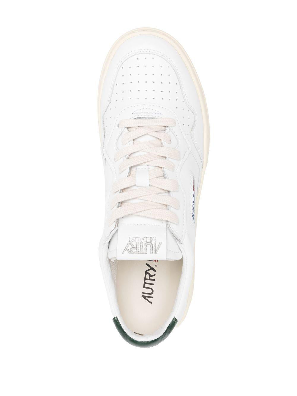 Sneakers bianche Medalist con tallone verde 