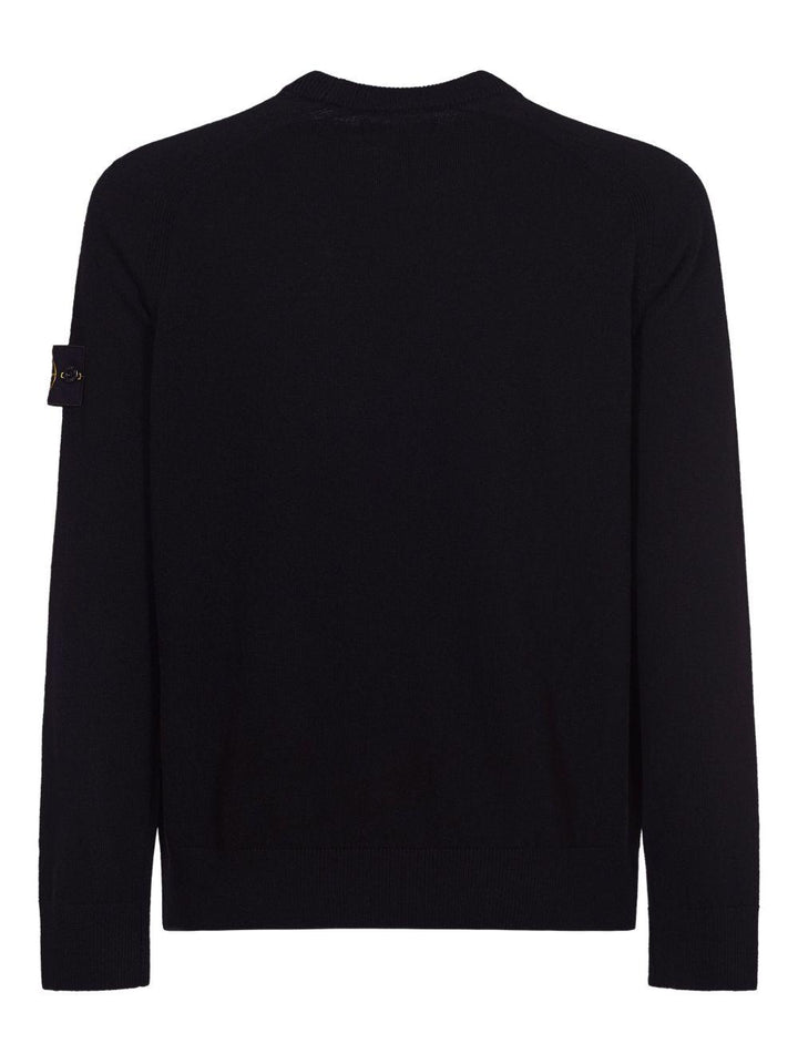Maglione nero girocollo con dettaglio a coste 