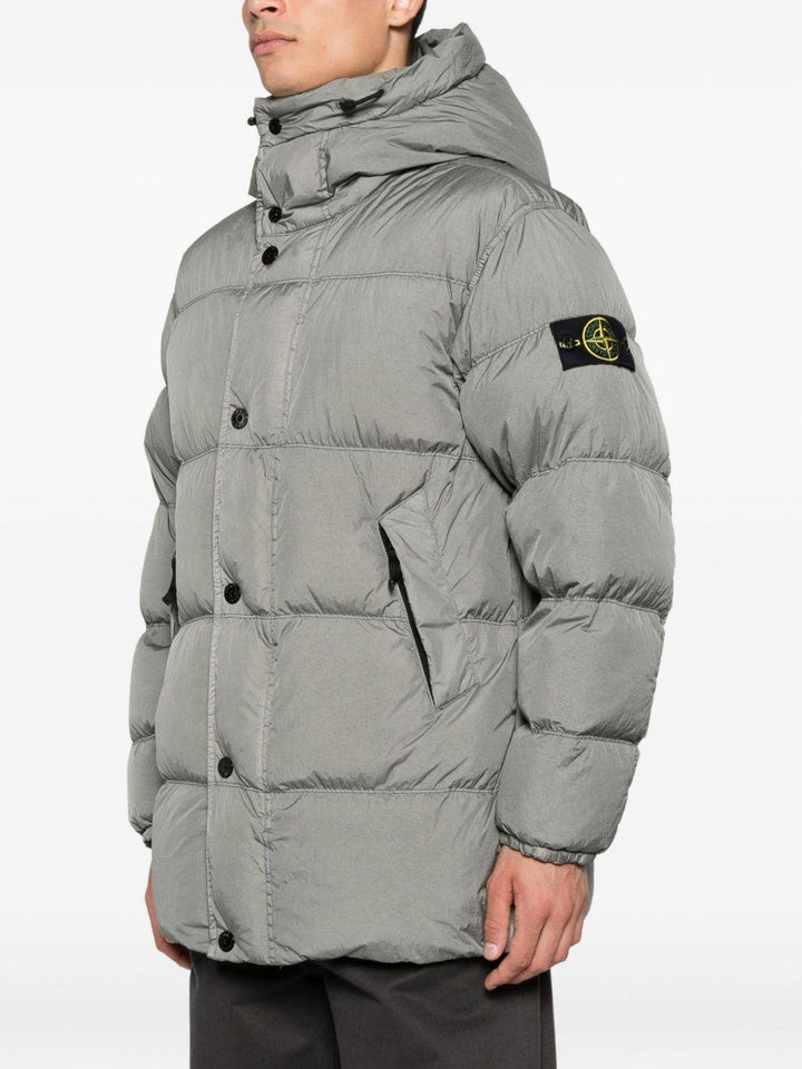 Cappotto grigio con cappuccio e coulisse in vita 