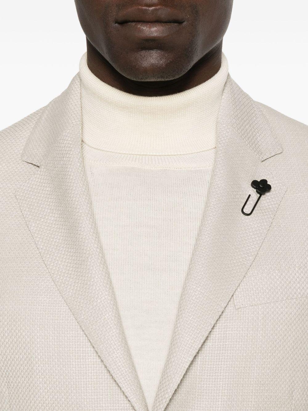 Giacca beige con tasche applicate 