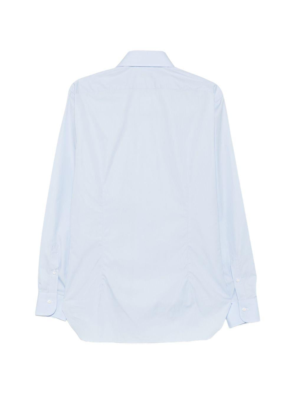 Camicia azzurra a maniche lunghe con colletto polo 