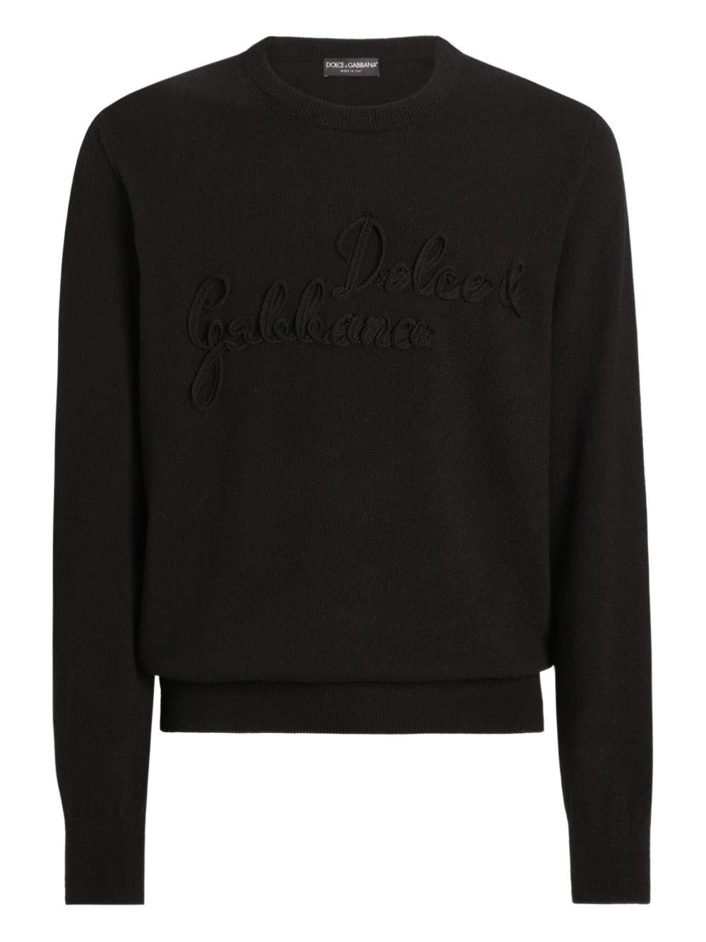 Maglione nero girocollo con logo ricamato 