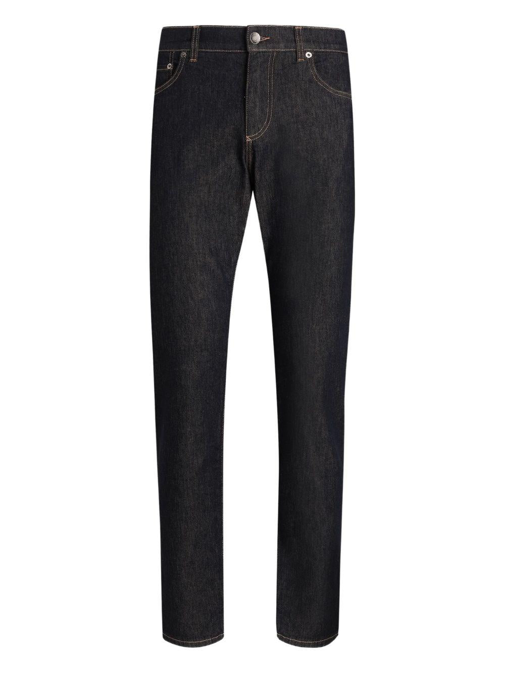 Jeans neri con placca logo 