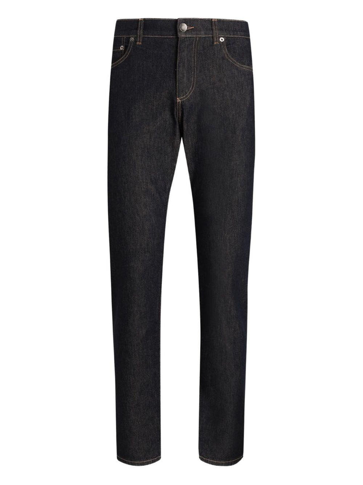 Jeans neri con placca logo 
