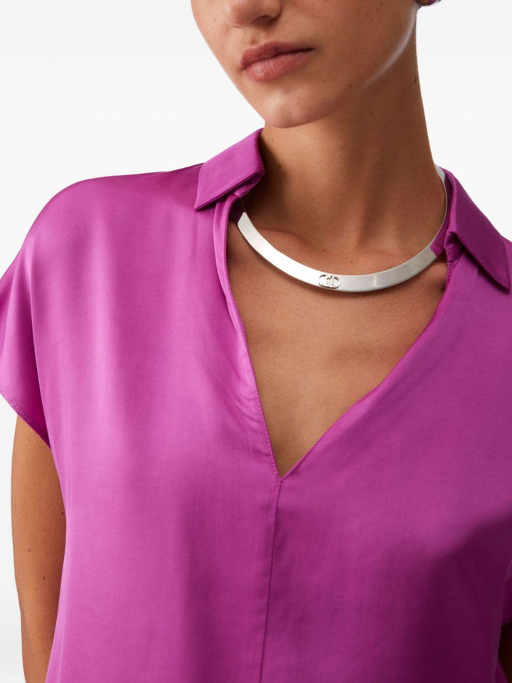 Blusa con scollo a V 