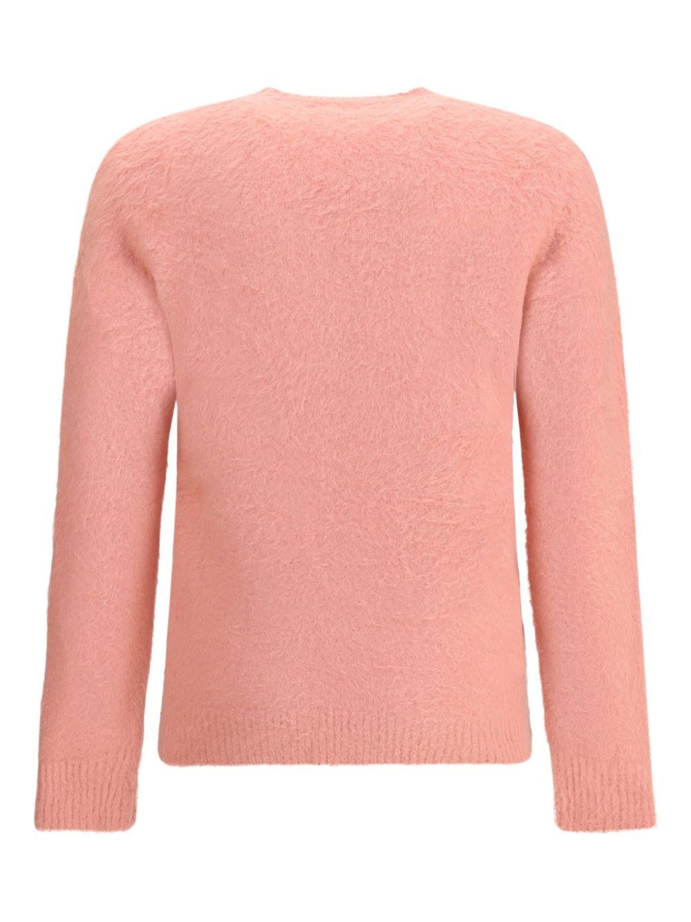 Maglione rosa con finitura morbida 