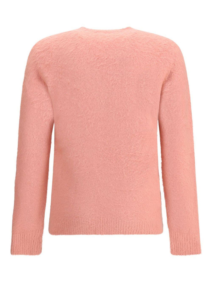 Maglione rosa con finitura morbida 