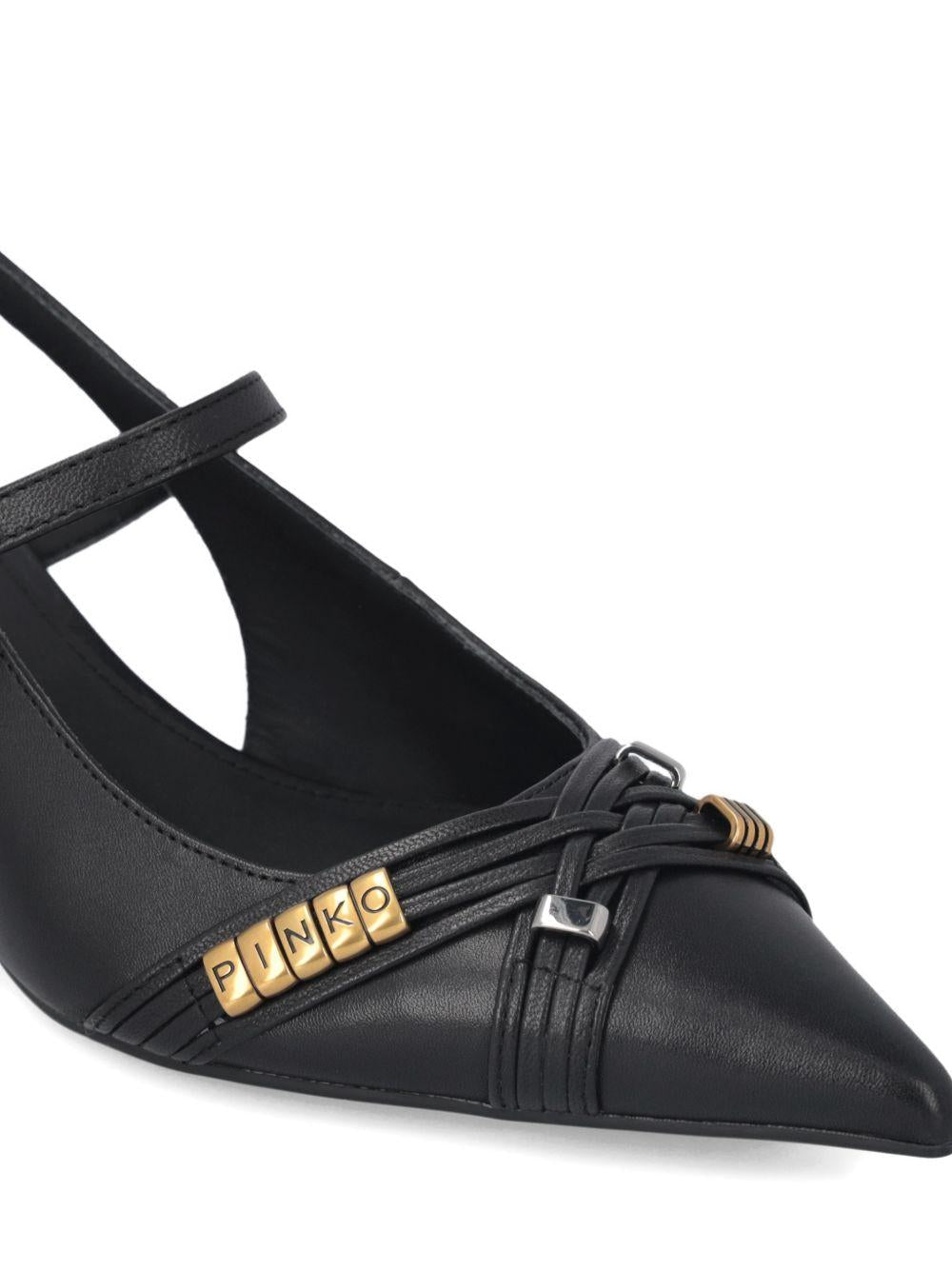 Pumps con cinturino posteriore 
