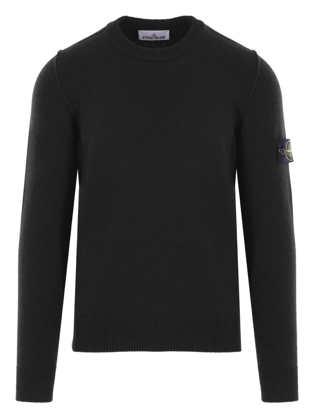 Maglione nero girocollo con applicazione Compass 