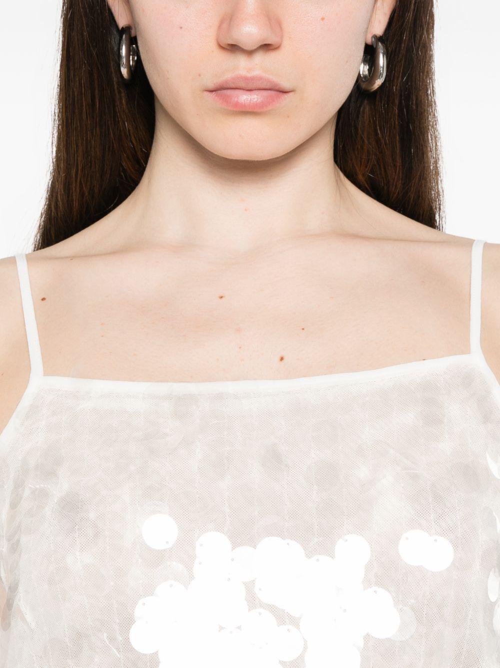Top Mela con paillettes 