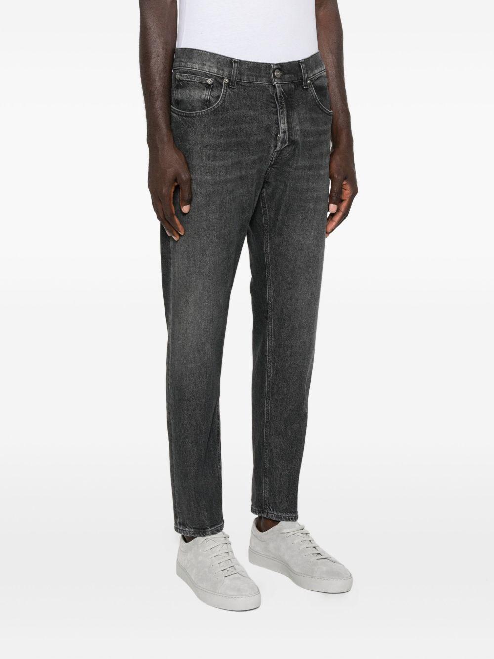 Jeans grigio con baffatura 