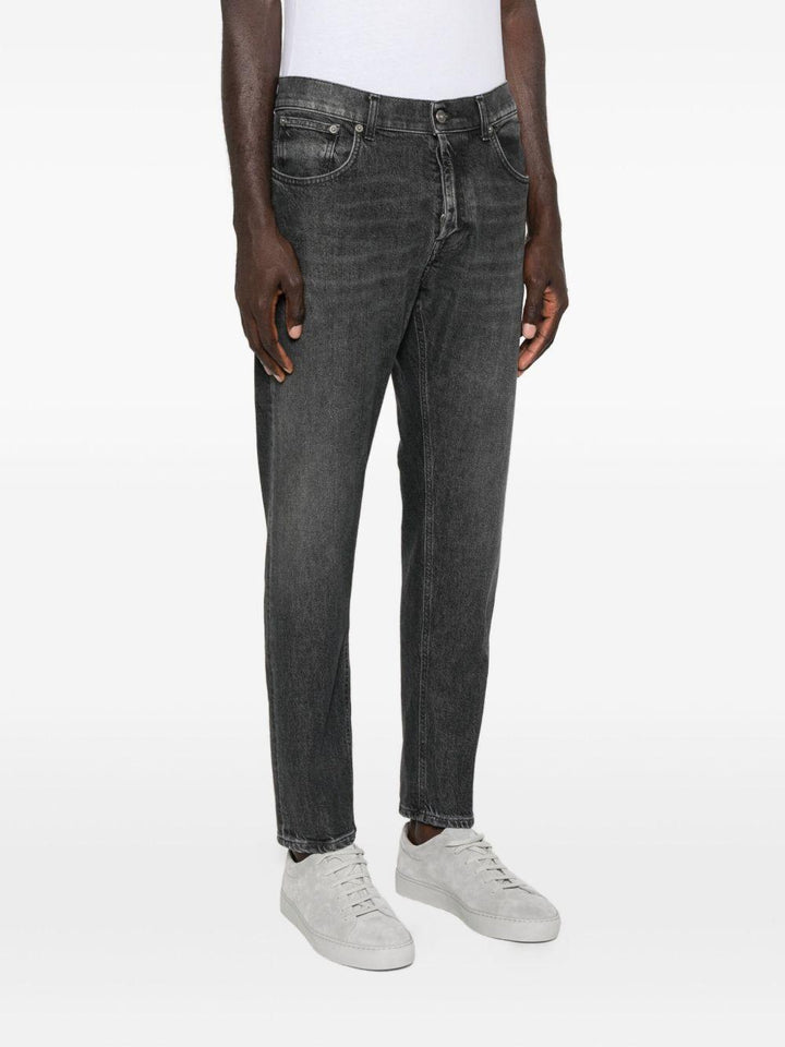 Jeans grigio con baffatura 