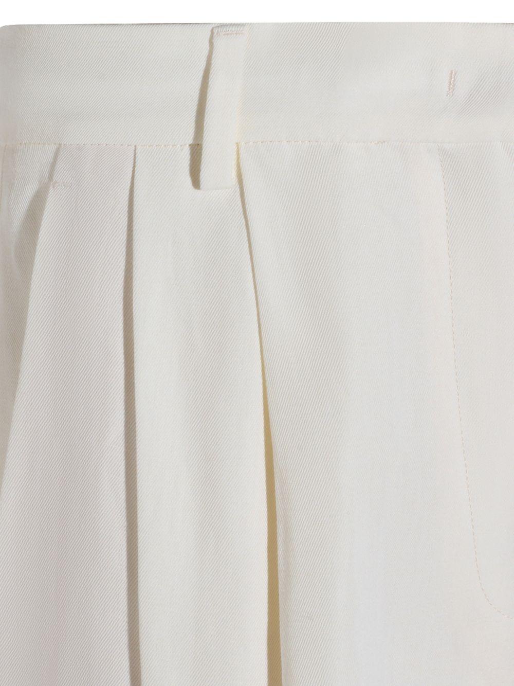 Shorts plissettati al ginocchio 