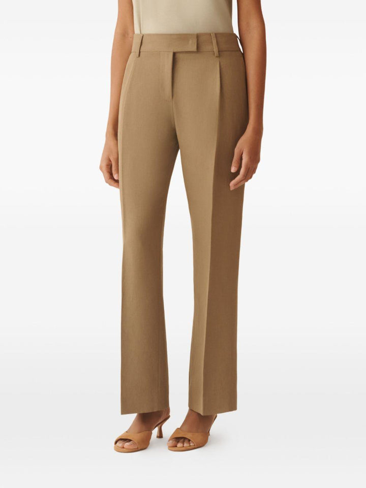 Pantaloni con chiusura nascosta 