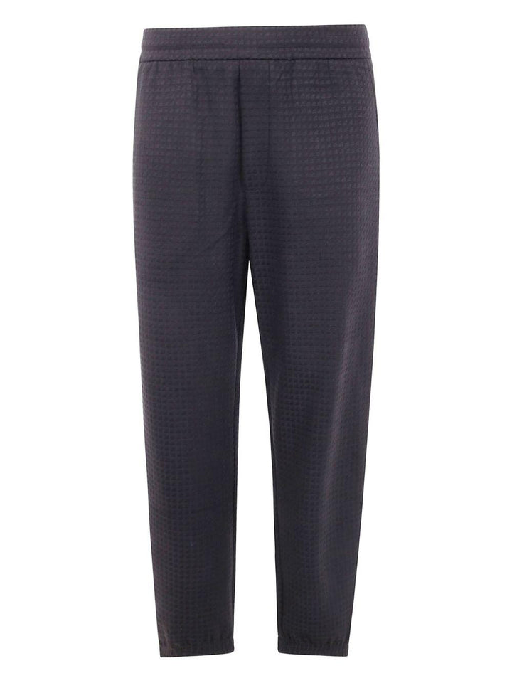 Pantaloni grigio scuro con lavorazione in rilievo 