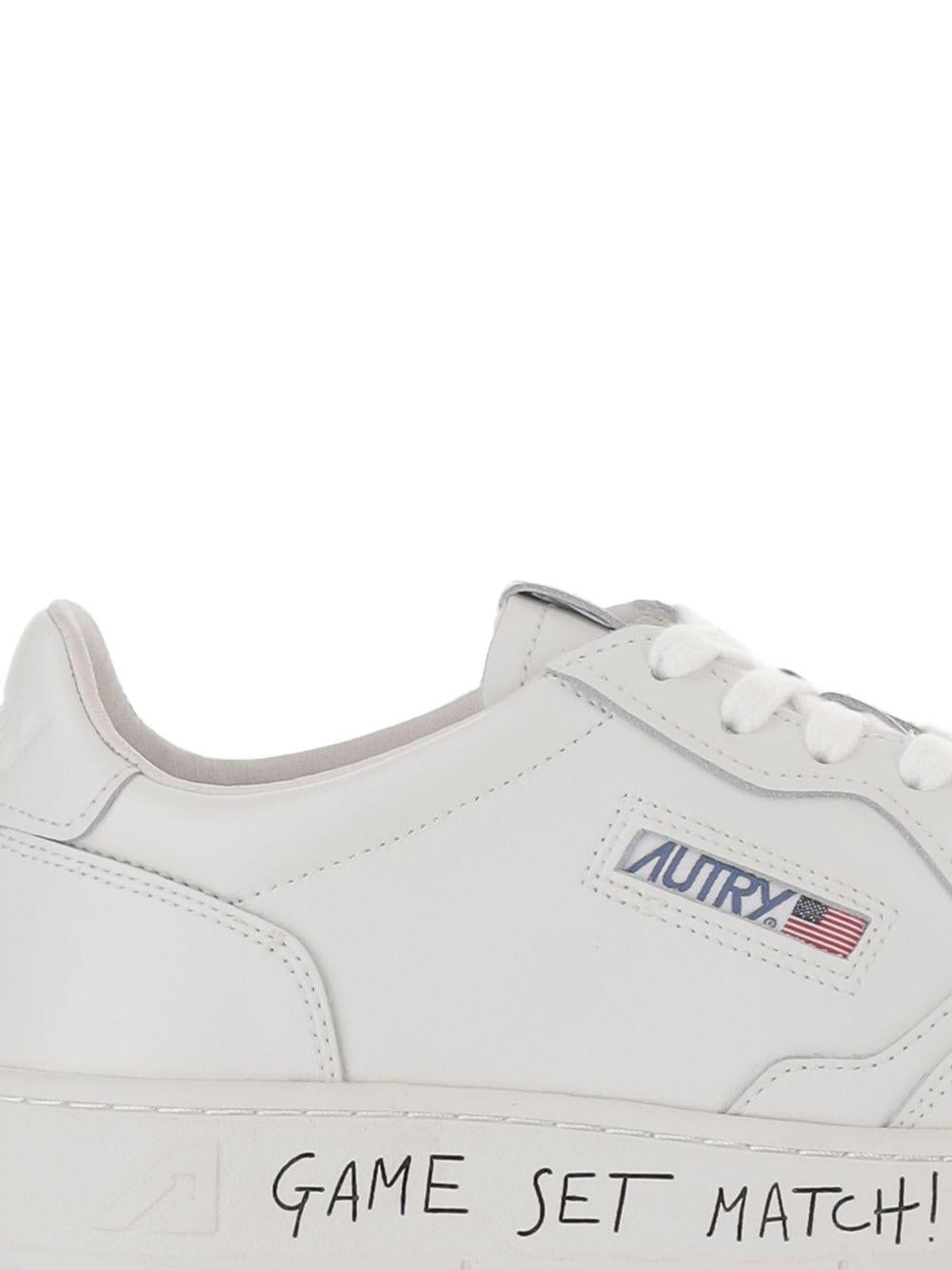 Sneakers bianche con stampa 